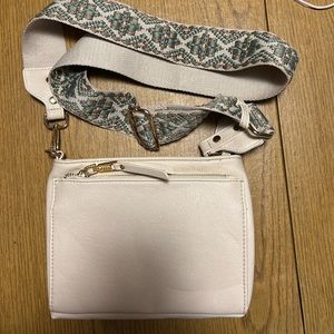 Off white crossbody bag with guitar strap